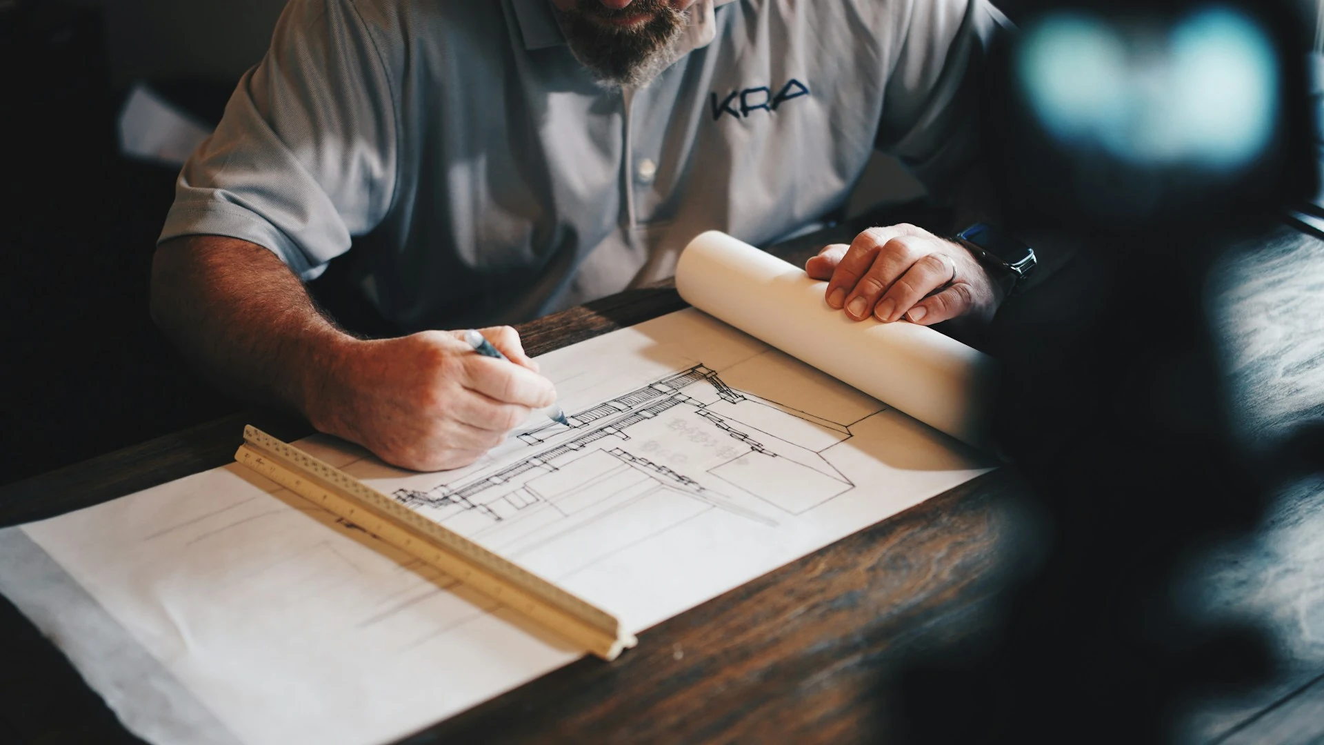 An architect working on drawing plans.