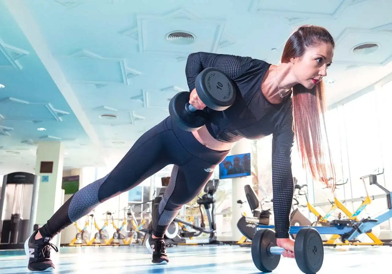 Woman exercising in a gym.