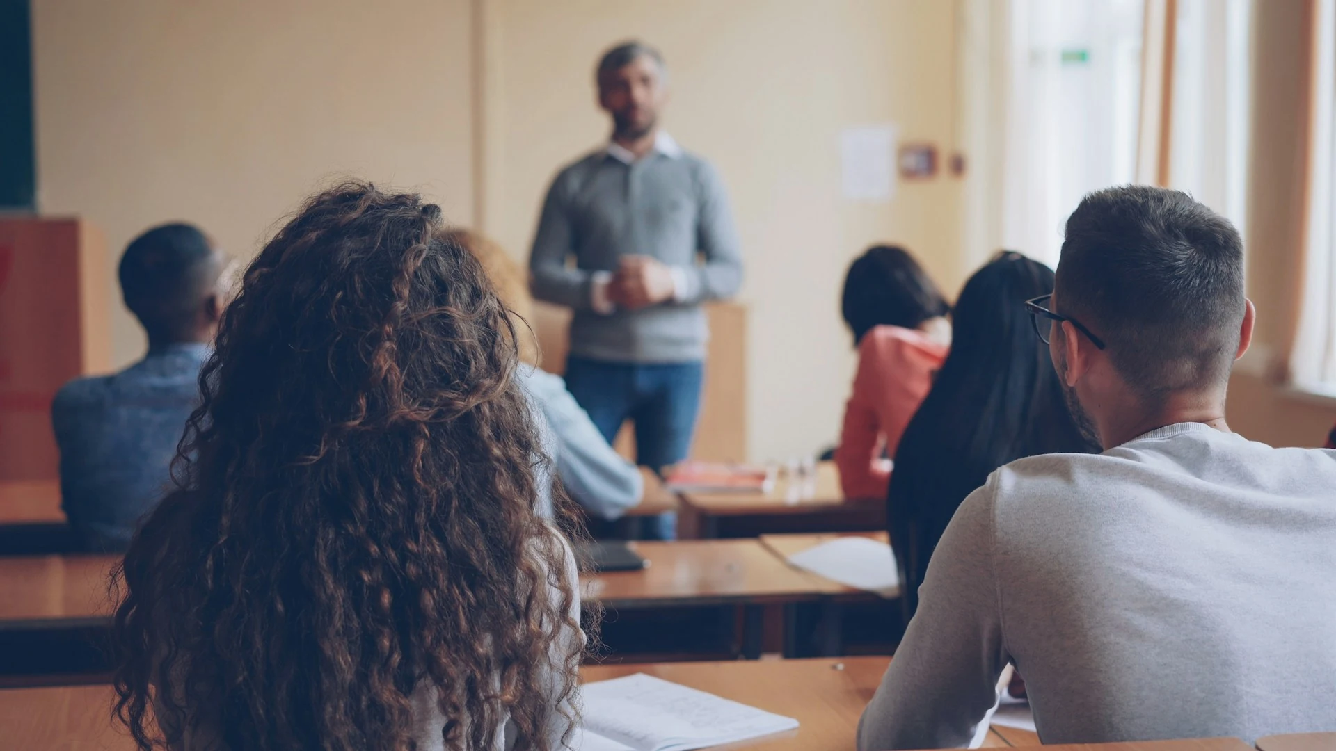 Students listening to a class lecture.