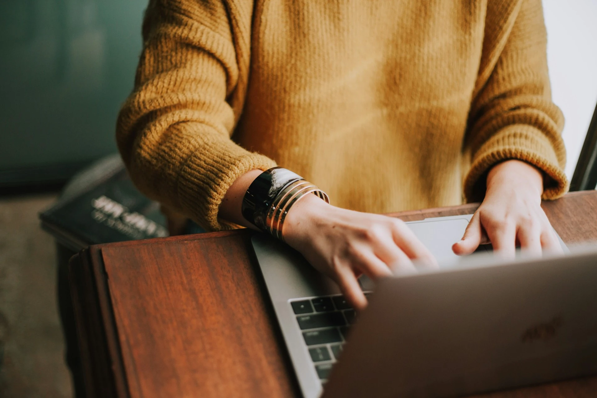 A person working on a laptop.