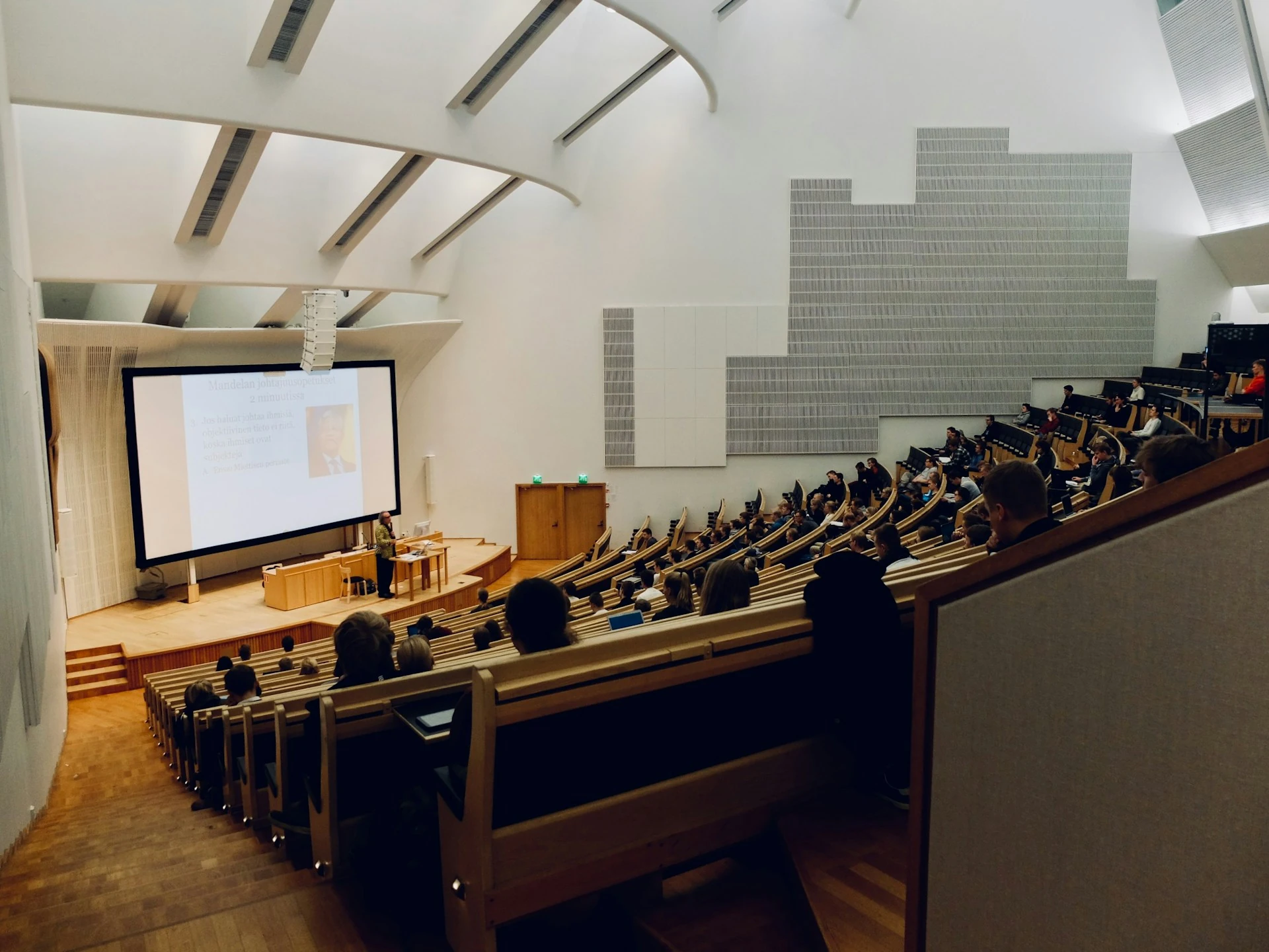 People sitting in a lecture hall.