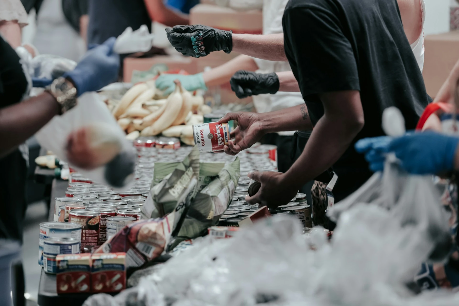 Volunteers sorting out food donations.