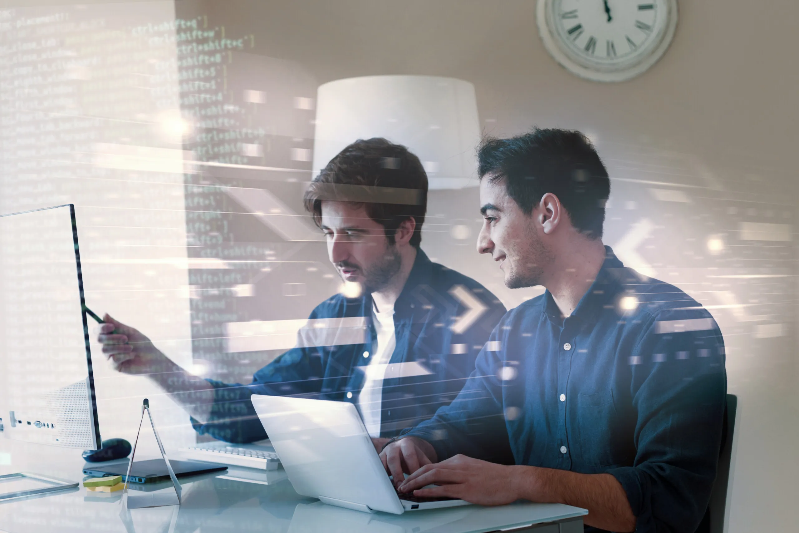 Two men developing software.