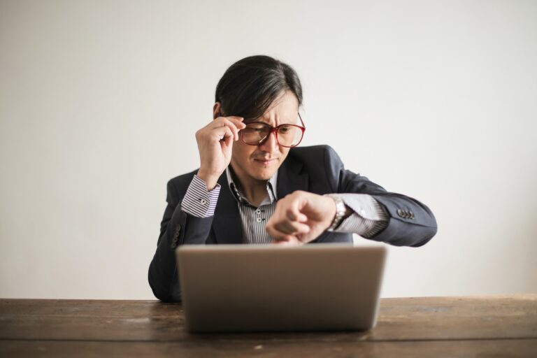 A man checking his watch for the time. Photo by Andrea Piacquadio: https://www.pexels.com/photo/confused-businessman-checking-time-on-wristwatch-3760810/