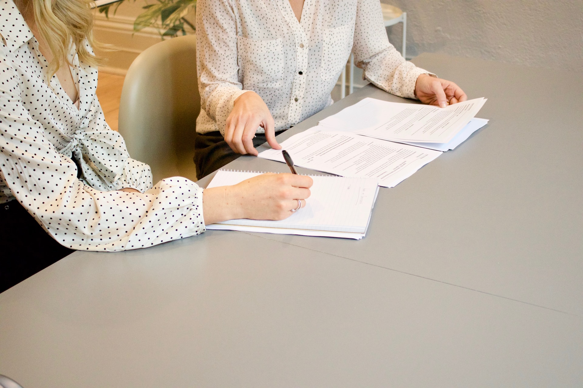 Employees filling out paperwork on the first day of work.