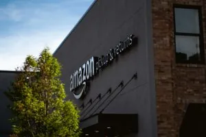 amazon building with pickup and return on sign