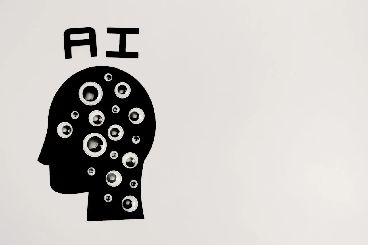 A silhouette of a head, filled with googly eyes, with the letters AI on top of it. AI image.