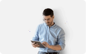 Man using a tablet to track time
