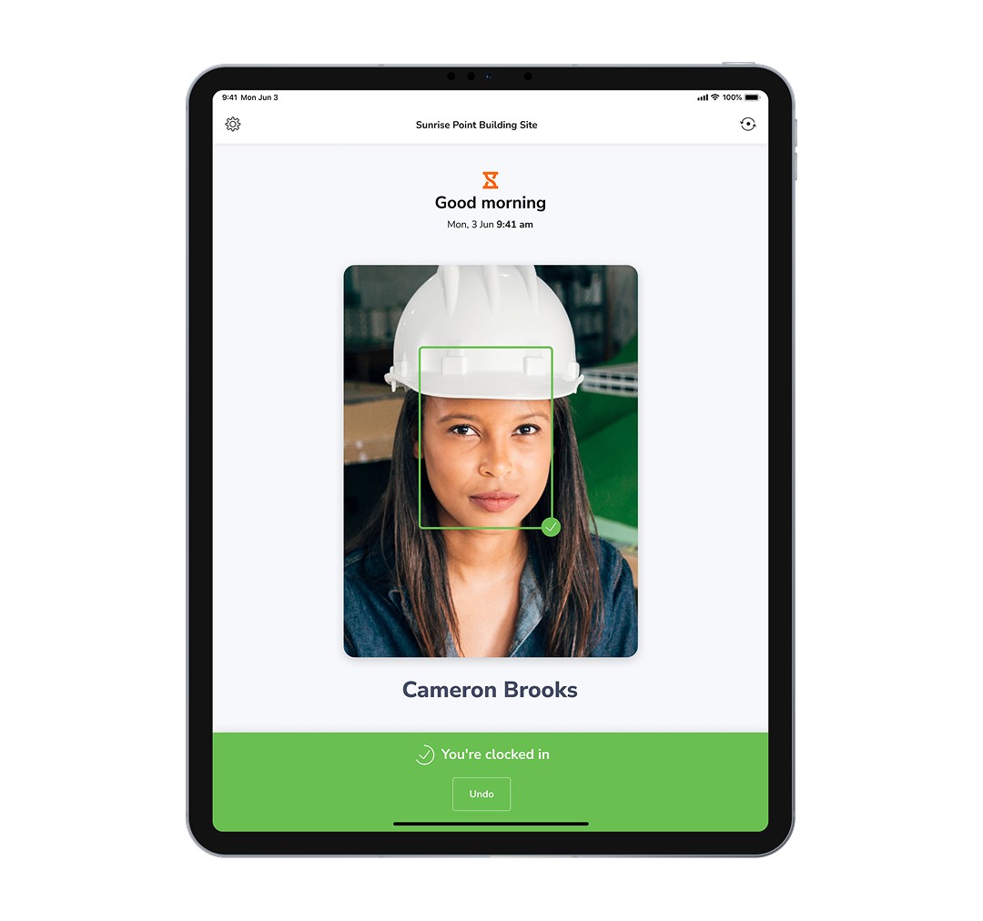 Workplace kiosk tablet for employee clock-in with face recognition